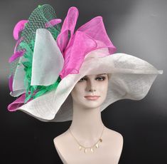 "Buying a hat? Don't forget to send me  your head measurement before placingyour order! IF YOU LIKE THE DESIGN, JUST WANT TO  CHANGE OR ADD SOME COLORS TO MATCH YOUR DRESS, PLEASE FEEL FREE TO CONTACT ME, I WILL DESIGN FOR YOU. This beautiful sinamay hat is an elegant wear at any church or derby event. its sinamay material is not too intimidating and attracts the eye. The chic flower adnorment that rests on the wide, side sweep brim is complemented by sinamay accentuations. Material: Sinamay wit White Felt Hat For Western-themed Events, Kentucky Derby, Wide Brim Hats For Beach & Kentucky Derby, Handmade Wide-brim Fedora For Kentucky Derby, Luxury Pink Sinamay Hat, Brimmed Fedora For Kentucky Derby, One Size, Flower Soft, Chic Flowers