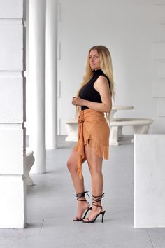 Our nutmeg colored tassel skirt is a stylish yet fun fall fashion piece Can be worn with a white or black top for a a sleek look Pair with strappy sandals for a festive feel Fast and free shipping in the United States. Items will arrive within 3-5 days Tassel Skirt, Fall Fun, Sleek Look, Black Top, Strappy Sandals, Fall Fashion, High Low Dress, Tassels, Autumn Fashion