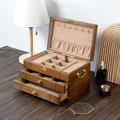 This elegant Wooden Jewelry Box is a spacious organizer designed to store and protect your precious jewelry. Featuring a secure lock, it ensures your items stay safe, while its compartments provide ample space for rings, necklaces, bracelets, and more. The timeless design makes it a thoughtful gift for women and girls, perfect for weddings, anniversaries, or special occasions like Mother's Day. Personalize it for an extra special touch, making it not just a storage solution, but a cherished keep Jewelry Box Organizer, Luxury Jewelry Box, Necklace Storage, Wooden Jewelry Box, Wooden Accessories, Box Organizer, Wood Jewelry Box, Jewelry Organizer Box, Wooden Jewelry Boxes