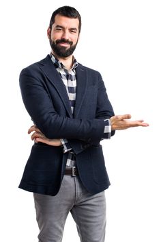 a man with his arms crossed posing for the camera