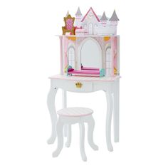 a doll house desk and chair with a mirror on it's top, set up to look like a princess castle