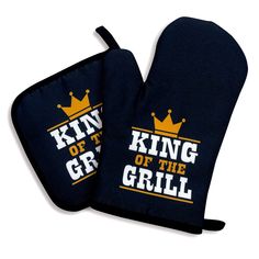 two oven mitts with the words king of the grill printed on them, one has a crown