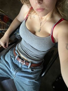 Tank Top And Jeans Outfit Aesthetic, Cargos And Tank Top, Bra Showing Under Tank Top, Fitted Tank Top Outfits, Baggy Tank Top Outfit, Tank Top Over Sweater, Baggy Jeans Small Top Outfit, Blue Tank Top Outfit Aesthetic, Tank Top And Baggy Jeans Outfit