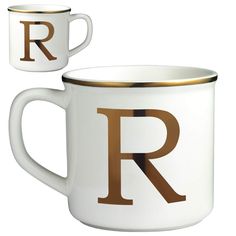 two white and gold coffee mugs with the letter r on them