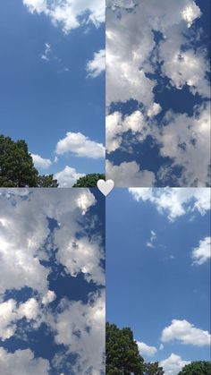 the sky is filled with white clouds and a heart shaped object in the middle of it