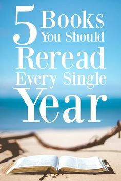 an open book sitting on top of a beach next to the ocean with text reading 5 books you should reread every single year