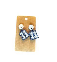 Sports numbered earrings!  I can do any colors or number. Send me your sports colors! These are hand painted and laser cut  You can change colors for your studs! Football Jewelry, Sports Numbers, Send Me, Favorite Things Gift, Color Change, Laser Cut, Jewelry Earrings Dangle, Etsy Earrings, Dangle Drop Earrings