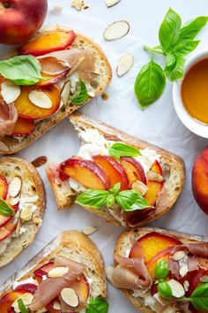 several slices of bread with fruit and nuts on them