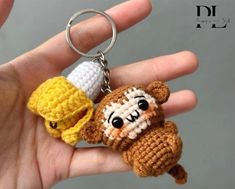 Crochet Monkey With Banana Keychain, Amigurumi Monkey, Crochet Baby Monkey Plush Toy Keychain, Monkey Stuffed Animal, Monkey Cute Gifts CUTE MONKEY WITH BANANA KEYCHAIN Materials: This lovely animal amigurumi is crocheted with cotton yarn, soft for skin. Cute mini monkey keychain is meticulously handcrafted by hand This cute baby monkey and banana amigurumi measures about 6cm in length CUTE GIFT FOR YOUR LOVERS If you are looking for a meaningful handmade gift, this little monkey keyring will be Banana Keychain, Monkey With Banana, Monkey Bag, Monkey Amigurumi, Monkey Cute, Amigurumi Monkey, Monkey Crochet, Mini Monkey, Plush Monkey