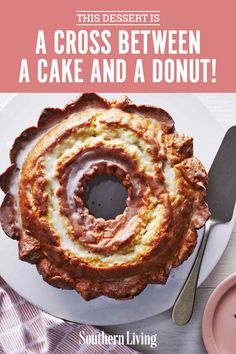 the cover of giant donut cake on a plate next to a fork and knife