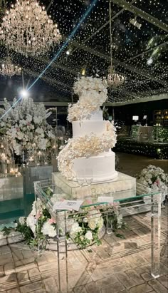 a large white cake sitting on top of a table