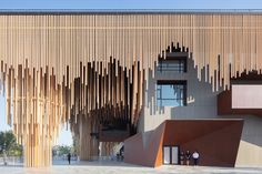 an architecturally designed building with wooden slats