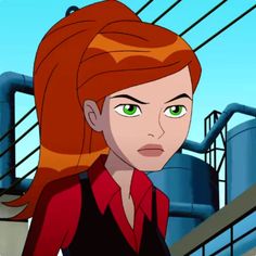 a woman with red hair and green eyes standing in front of an industrial area, looking at the camera