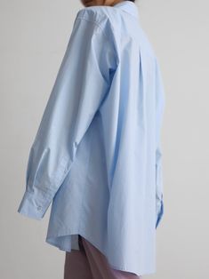 Oversized long sleeve button down shirt with padded shoulders. Stunning silhouette. Collared and button down front with breast pocket detail. Model is wearing MINUSEY ONE SIZE. ✔️ Free worldwide express shipping over $100✔️ Loved by 6,500+ customers✔️ Limited edition collections, maximum style⠀⠀⠀⠀⠀⠀⠀⠀⠀Stay ahead of the trend with can’t-find-anywhere-else staples. Your closet will thank you 💕 MINUSEY ONE SIZE = EU 34-38, US 2-6 100% Cotton Dry clean Made in Korea - Model Height: 172cm/5'7" (US 2, EU 34) Shirting Fabric, The Frankie Shop, Frankie Shop, Oversized Long Sleeve, High Low Hem, Pocket Detail, Oversized Shirt, Color Light, Oversized Fits