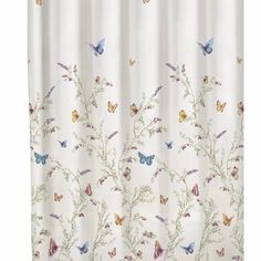 a white shower curtain with butterflies on it