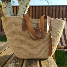 "Elevate your summer style with our collection of market bags, French basket bags, beach bags, jute bags, and summer bags.  These fashionable and eco-friendly accessories are perfect for carrying your essentials while making a statement.  Shop now and embrace the chic vibes of the season! Handmade jute bag made in Ukraine💛💙 Your orders are a huge support for us❤️     Size & Materials  Height: 10-11\" (27-28 см) Width: 17\" (45 см) Bottom width: 4-5\" (12,5 см) 100%Jute Made from zero-waste natural jute rope. Absolutely eco-friendly.  Warning!  ** The real color of the item may be slightly different from the pictures shown on the website caused by many factors such as the brightness of your monitor and light brightness. Pay attention! ** Please be aware that some countries impose customs French Basket, French Baskets, Bridesmaid Tote Bags, Jute Tote Bags, Jute Totes, Summer Tote Bags, Straw Beach Bag, Jute Bag, Bag Summer