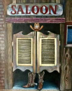 a painting of cowboy boots in front of a saloon door with the word saloon painted on it