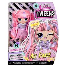 a pink doll with long hair and big eyes in a box on a white background