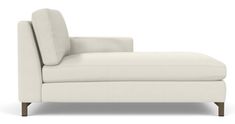 an image of a white couch that is on the floor in front of a white background