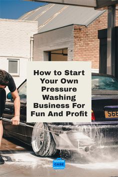 a man washing his car with water from the hose that is running out of it