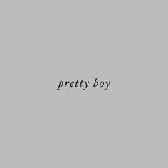 the words pretty boy are written in black on a gray background, and there is no image to describe