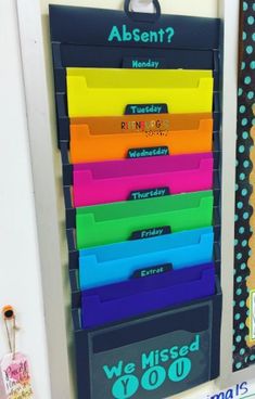 an assortment of colored file folders on display