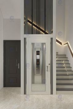 an elevator with stairs leading up to the second floor in a modern building or apartment