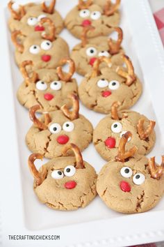 cookies with reindeer noses and pretzels on a plate