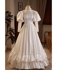 Get 10% off now! Buy vintage inspired bubble long sleeved satin wedding dress with collar at wholesale price online. Free shipping and pro custom service since 2009. Wedding Dress Peter Pan Collar, Luxury Vintage Dresses For Cosplay, Medieval Clothing Wedding Dress, Luxury White Elegant Victorian Dress, Puff White Dress, Luxury Ruffled Vintage Dress For Vintage Events, Luxury White Victorian Dress, Luxury Victorian Dress With Ruffles In Satin, Luxury White Victorian Dress For Vintage Events