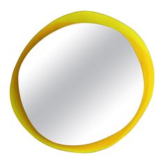 a yellow circular mirror on a white background