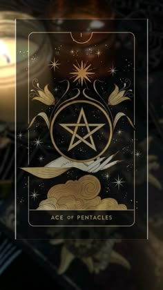 the ace of pentacles tarot card with candles in the background