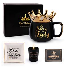 a black coffee mug with a gold crown on top and coasters next to it