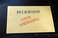 a piece of paper with the words mission and top secret on it sitting on a table