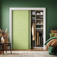 a bedroom with green walls and wooden flooring, an open door to the closet