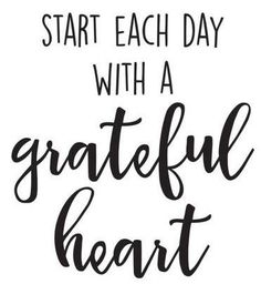 a black and white poster with the words start each day with a grateful heart on it