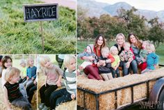 a group of people sitting on top of hay next to a sign that says hay ride