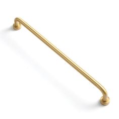 an antique brass pull handle on a white background