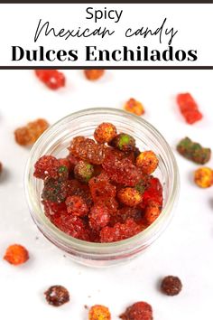 a small glass jar filled with colorful candies and text overlay reads spicy mexican candy dulces enchilados