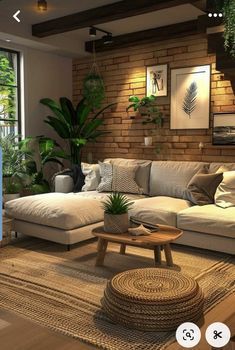 a living room filled with furniture and plants