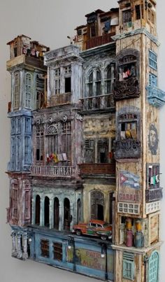 an art piece made out of old buildings with balconies and balconies on them