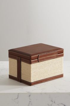 a brown and white box sitting on top of a counter