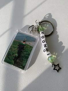 a keychain that has a photo on it