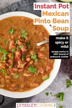 a bowl of mexican pinto beans soup with tortilla chips on the side