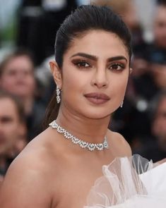 an image of a woman wearing jewelry on the red carpet