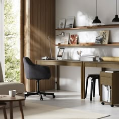 a room with a desk, chair and bookshelf in the middle of it