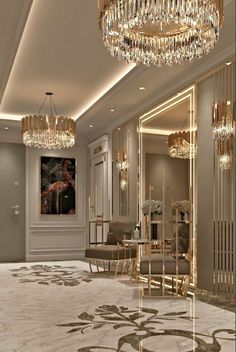 an elegant living room with chandeliers and mirrors