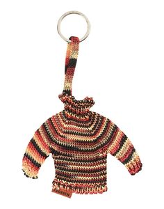 a knitted sweater keychain hanging from a metal ring on a white background