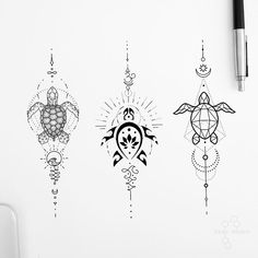 three turtle tattoos on a white wall next to a pen