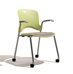 an office chair with wheels and a green seat