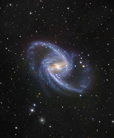 an image of a spiral galaxy in the sky